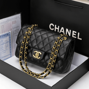 Chanel diamond chain shoulder bag presented in a black box with a signature Chanel logo and diamond chain detail.